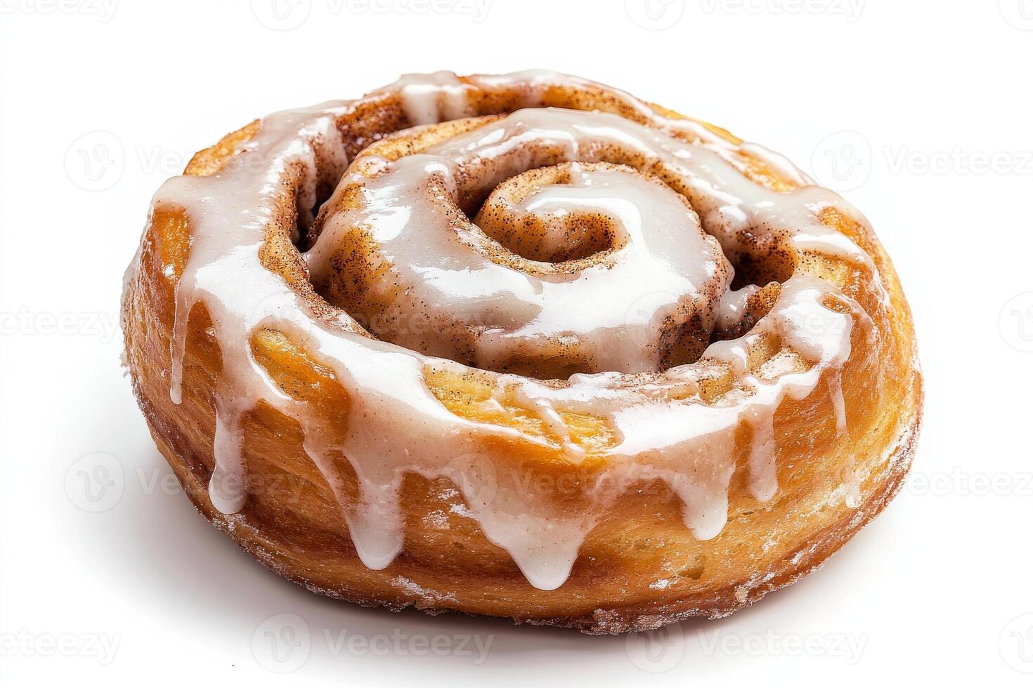 A cinnamon roll with icing on top photo