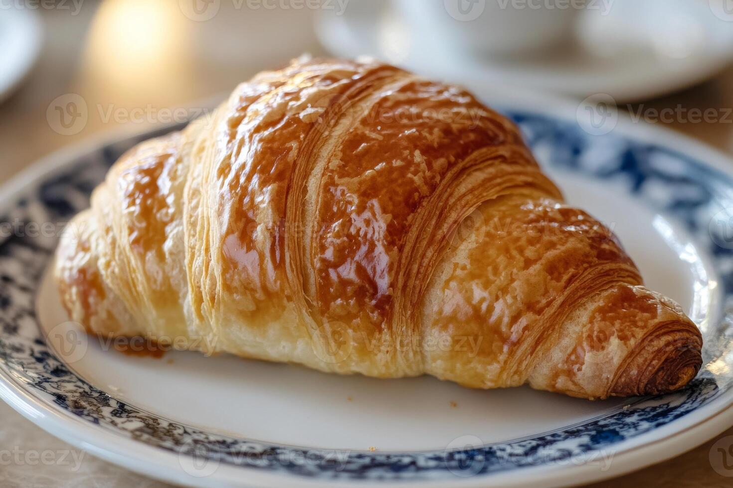 A croissant on a plate photo