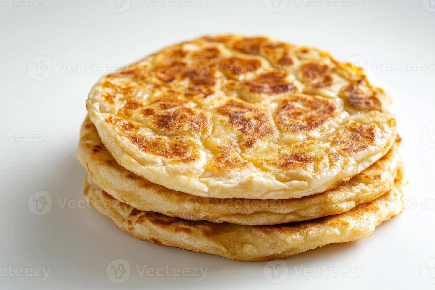 Three pancakes stacked on top of each other photo