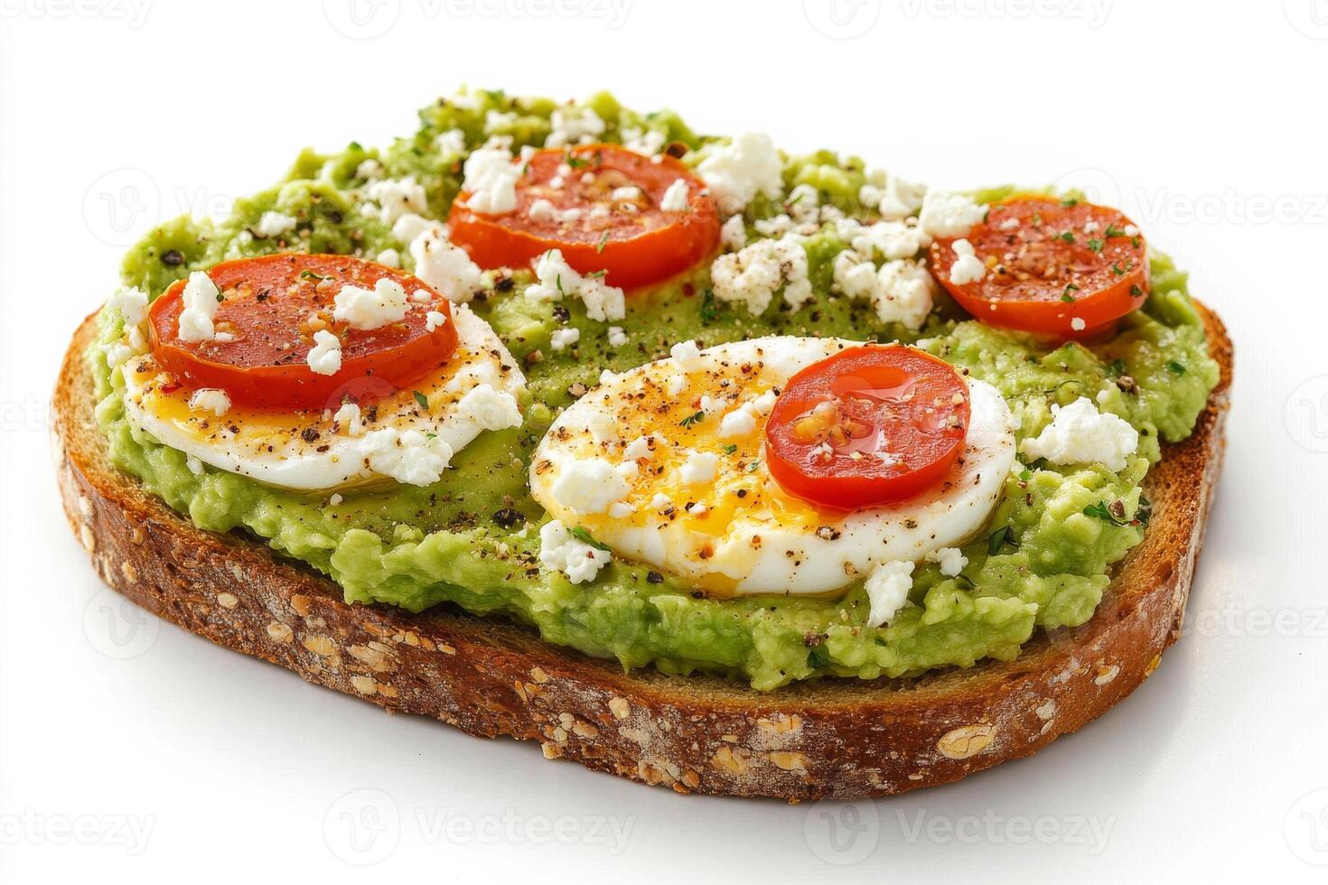Avocado toast with eggs and tomatoes photo