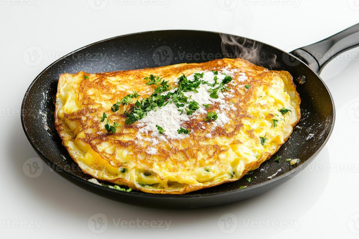 An omelet is being cooked in a pan photo