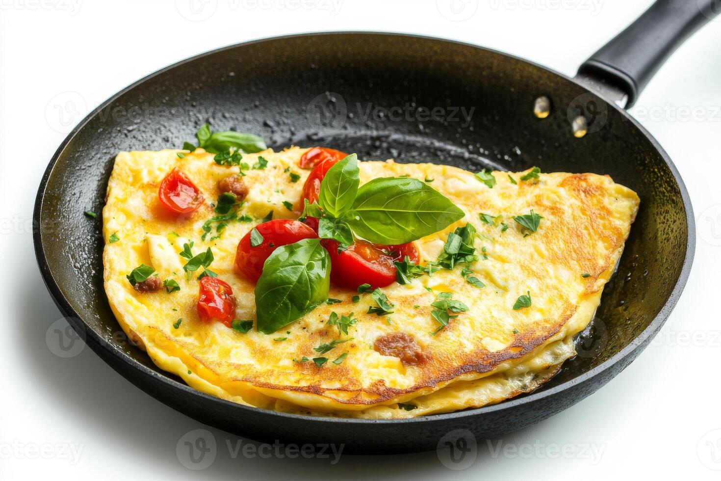 Omelet with tomatoes and basil on white background photo