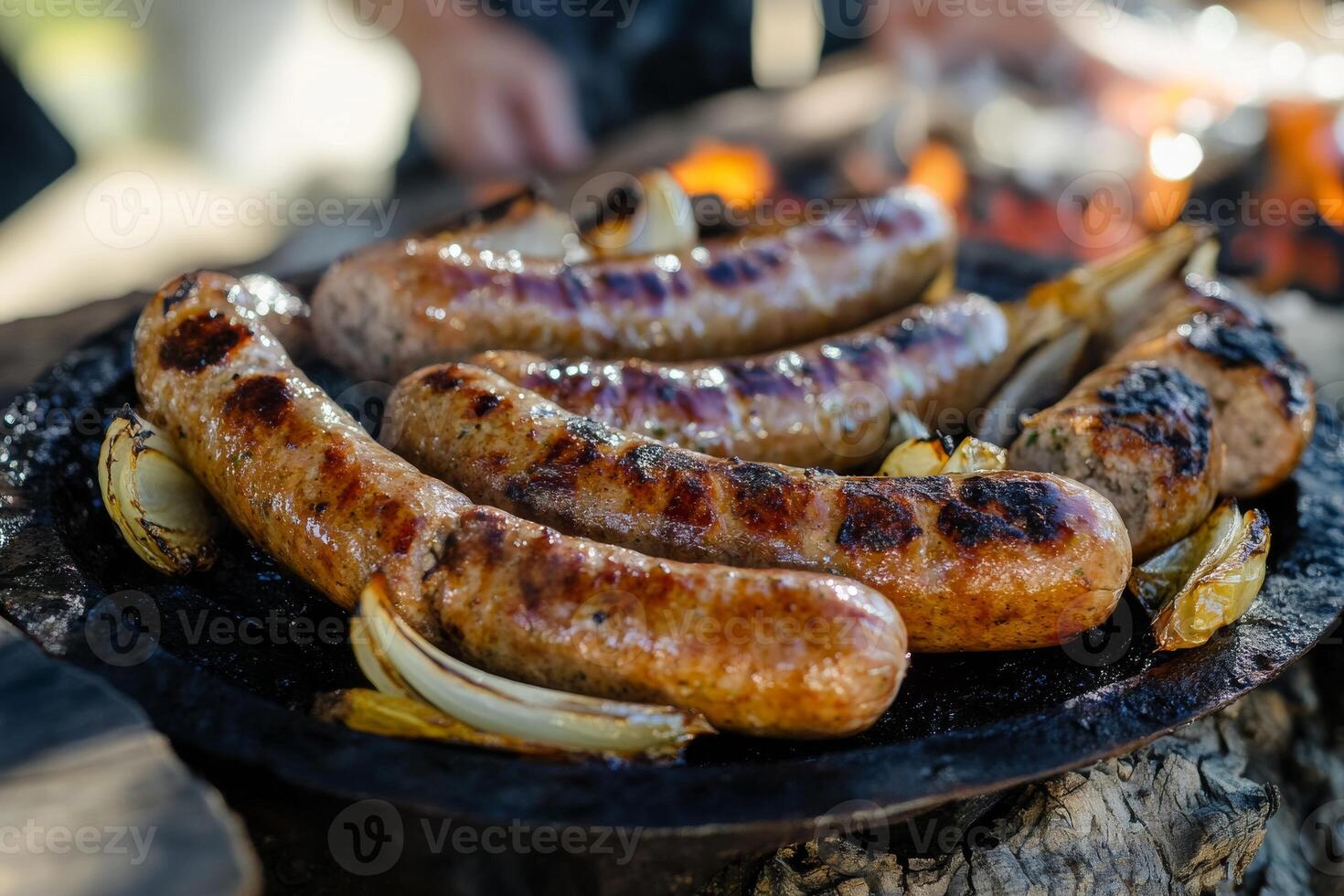 Grilled sausages on a grill photo