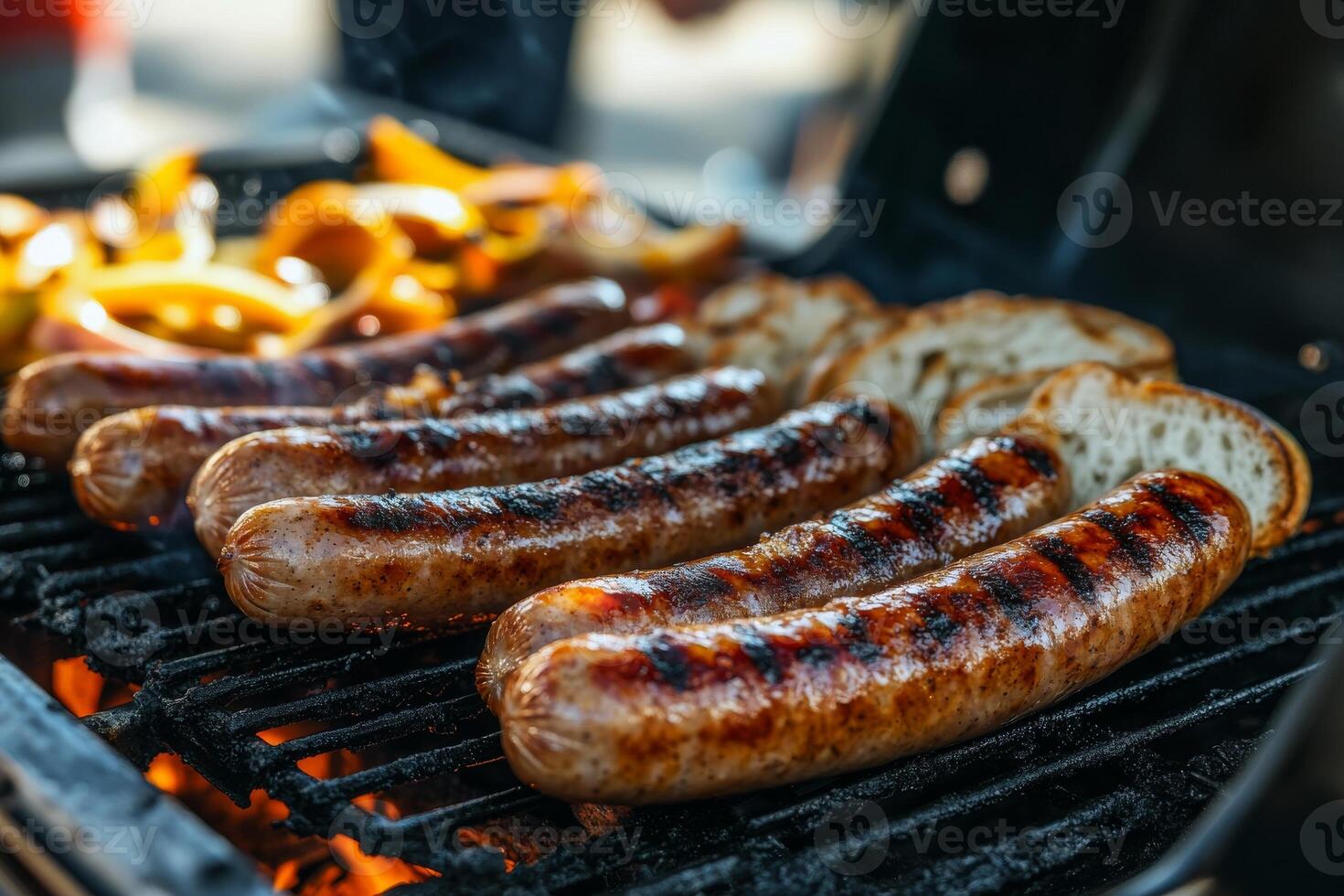 Grilled sausages on a grill photo