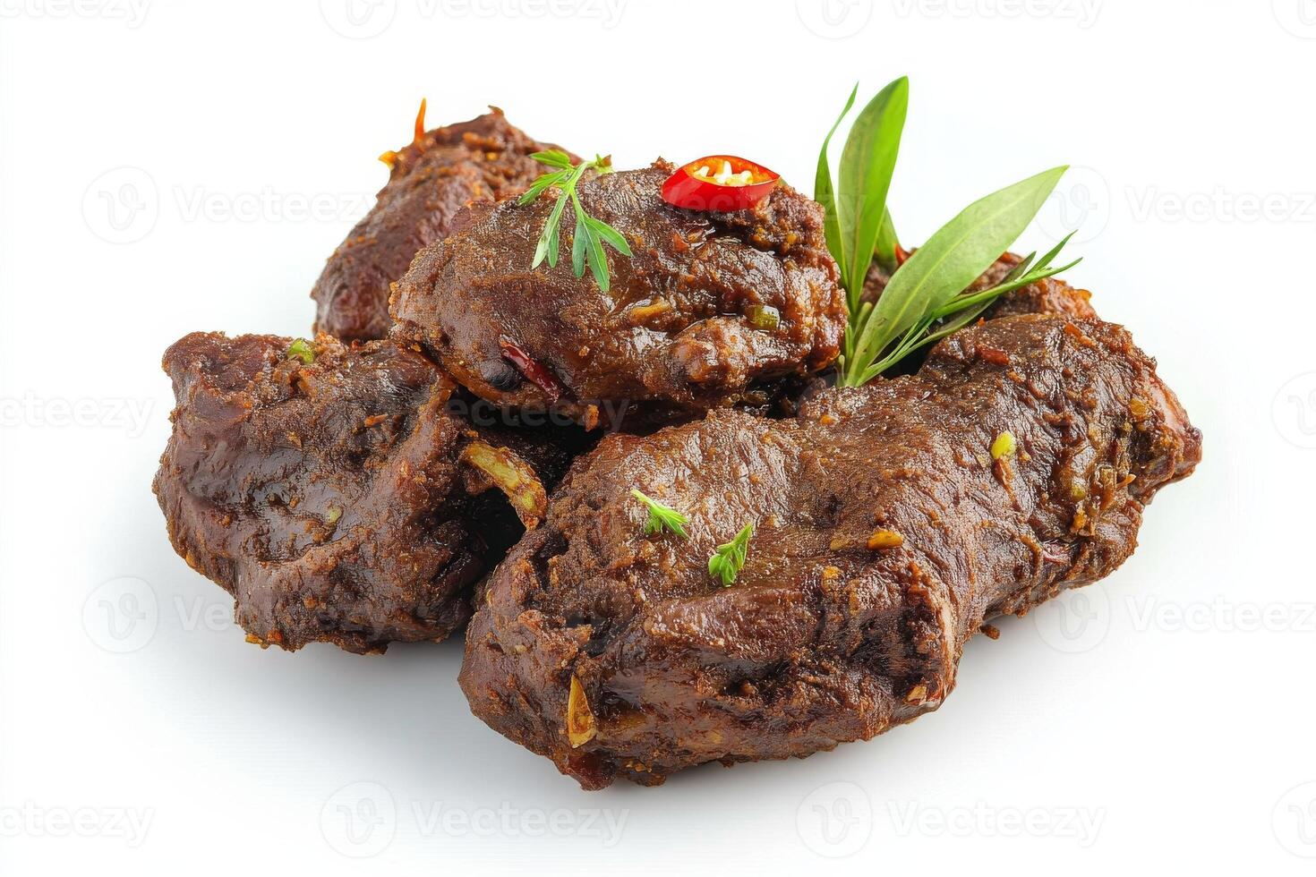 A pile of meat with herbs and spices photo