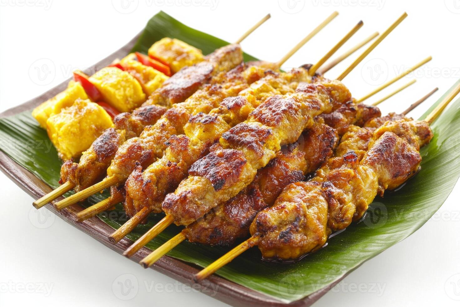 A plate of skewers with meat and vegetables photo