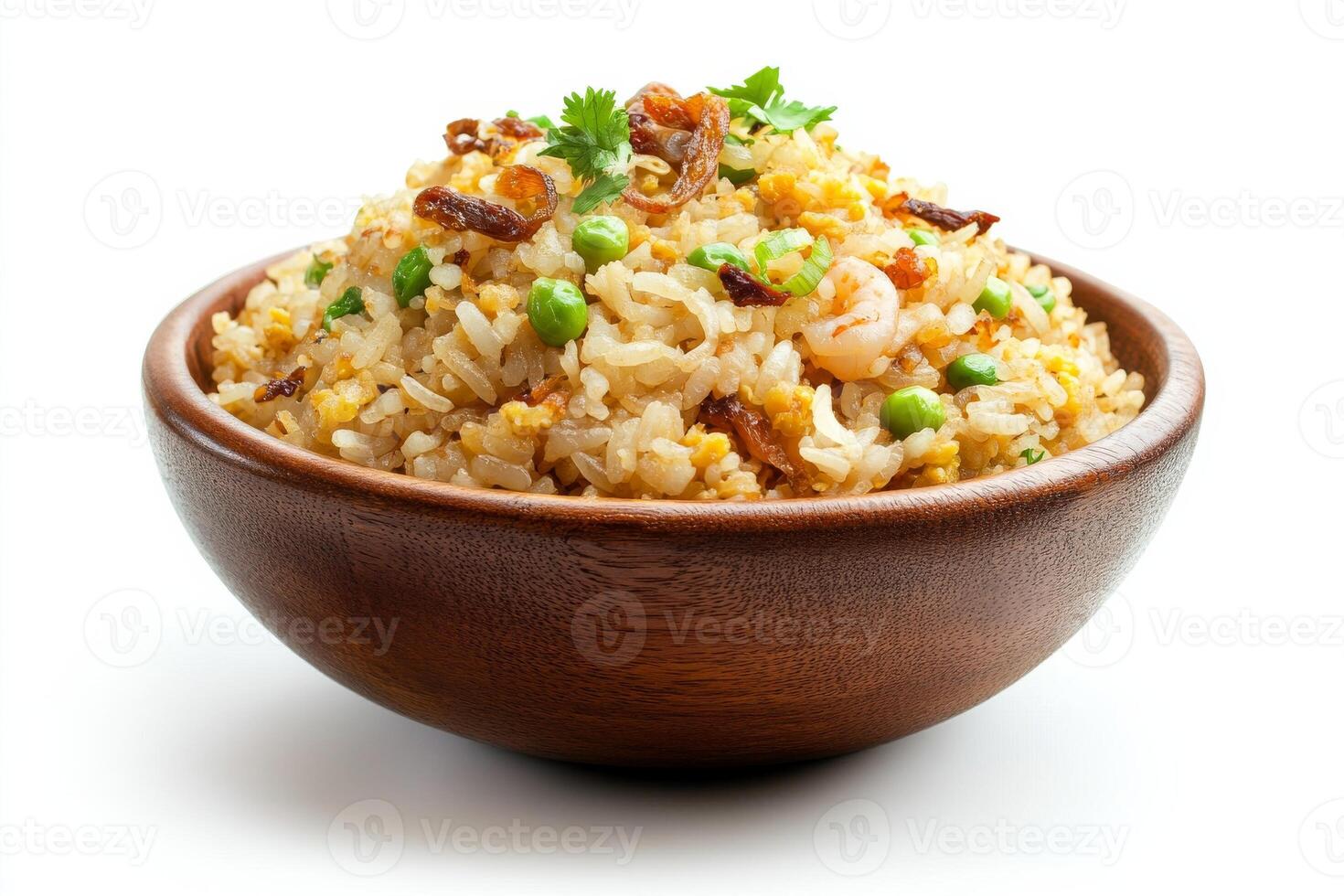 A bowl of fried rice with peas and carrots photo