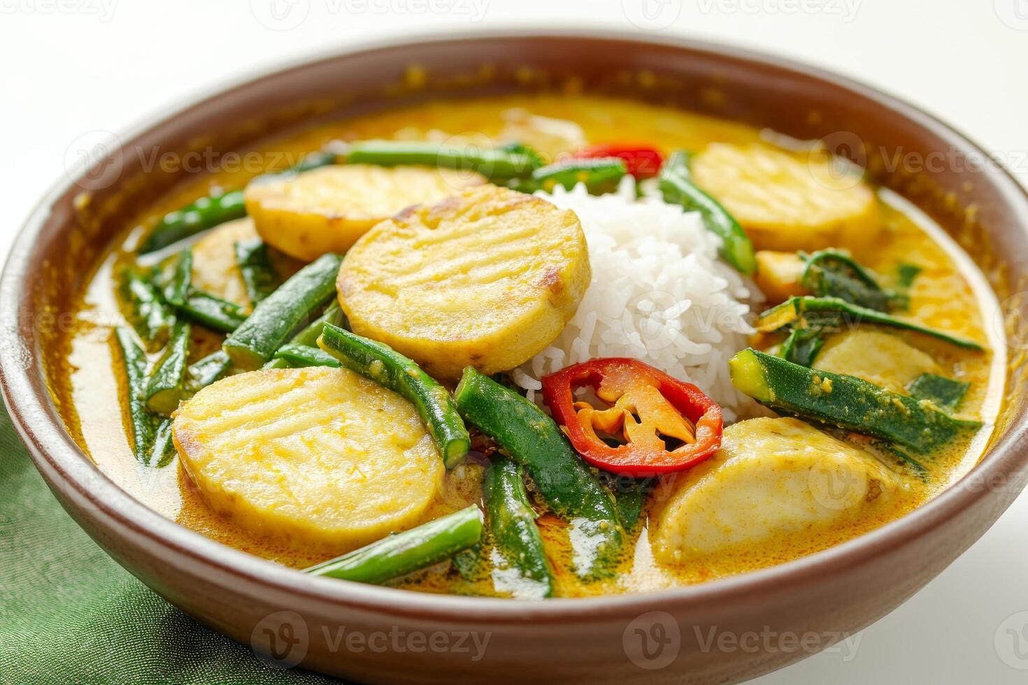 A bowl of food with rice and vegetables photo