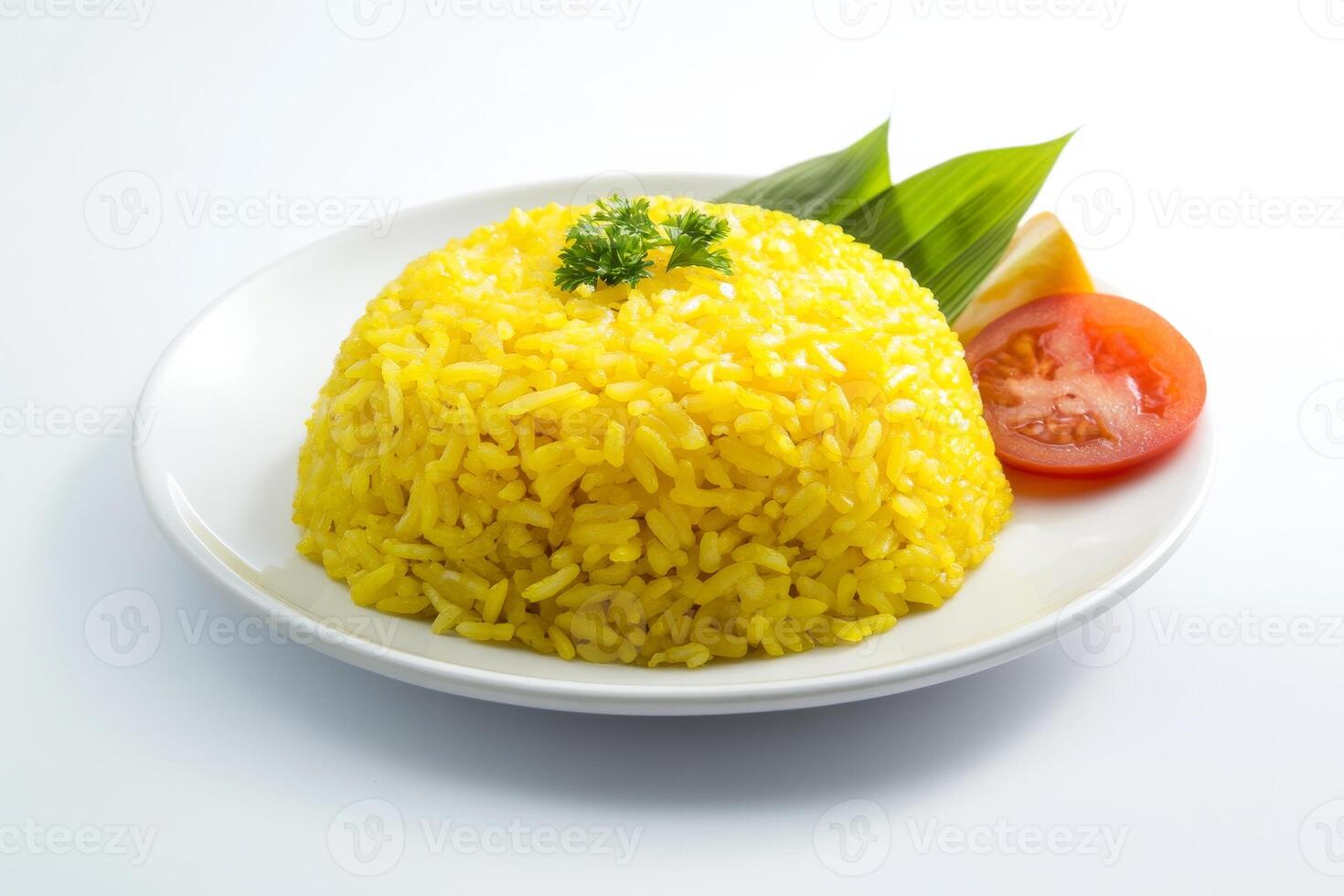 A plate of yellow rice with a tomato and parsley photo