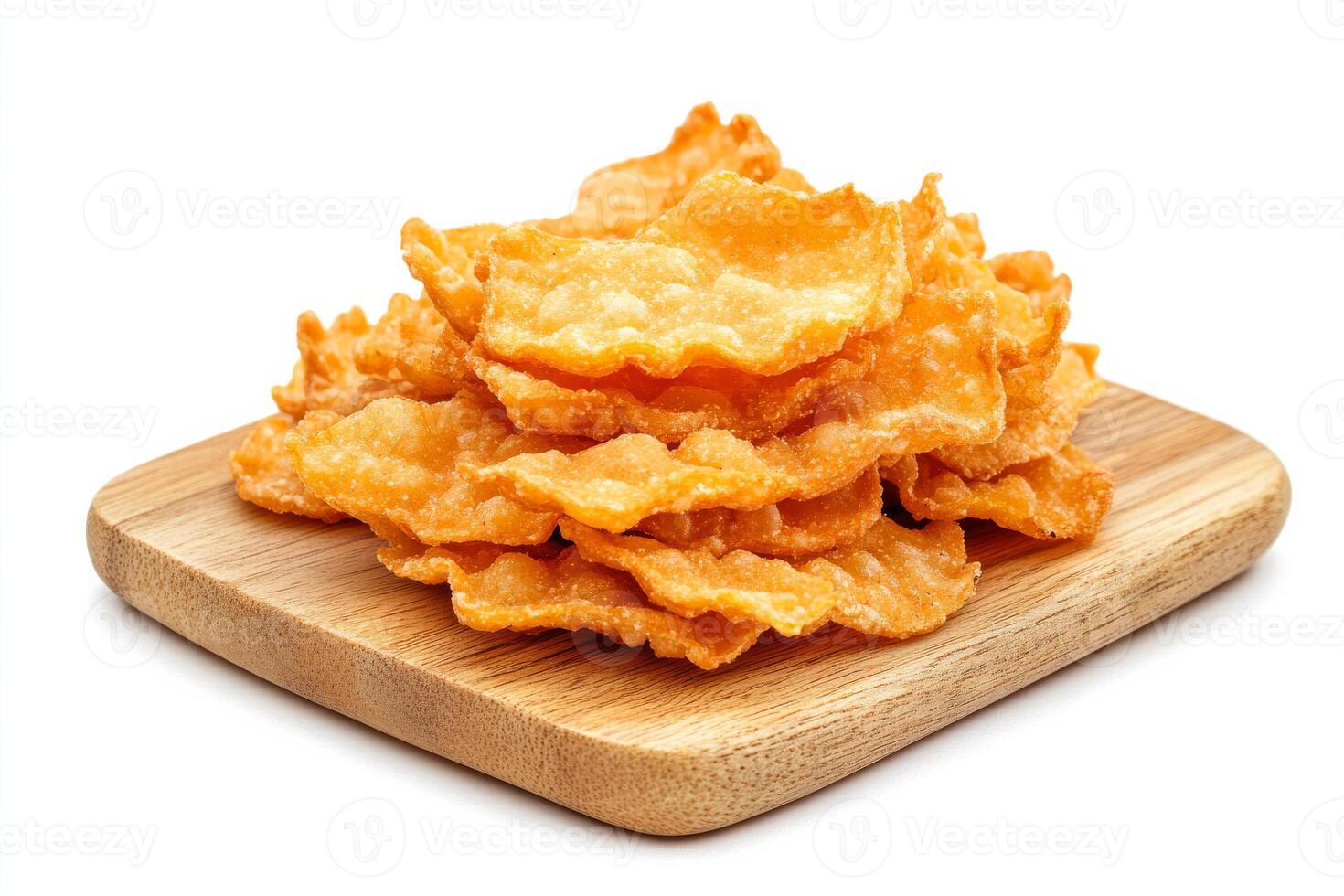 A pile of fried chicken wings on a wooden board photo
