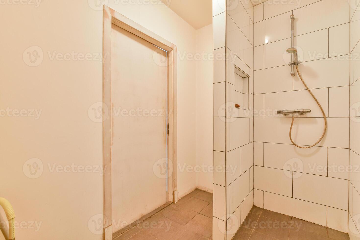 A bathroom with a shower and toilet in it photo