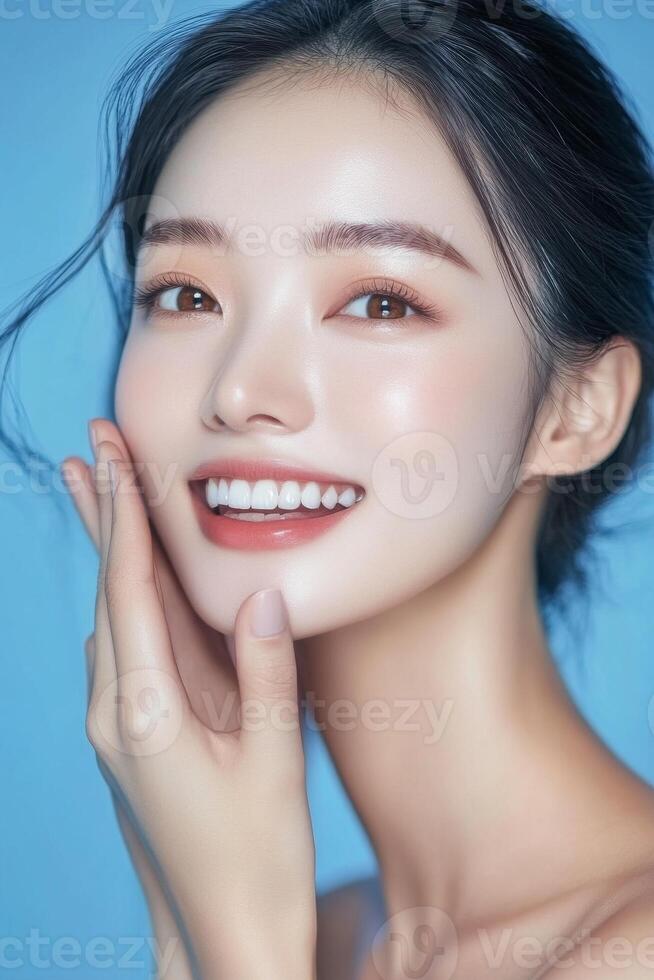 Beautiful asian woman with skin care products photo