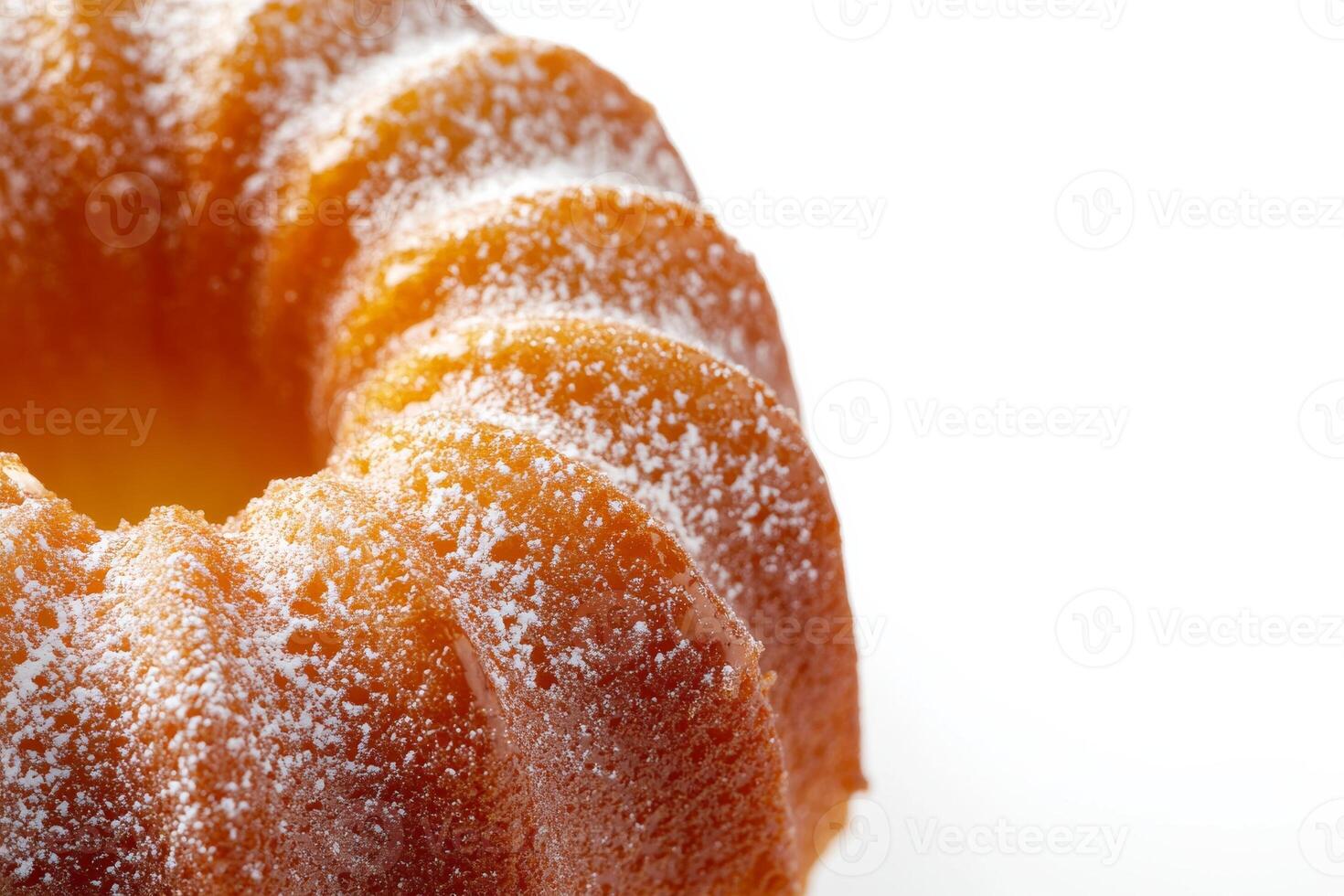 A bundt cake with powdered sugar on top photo