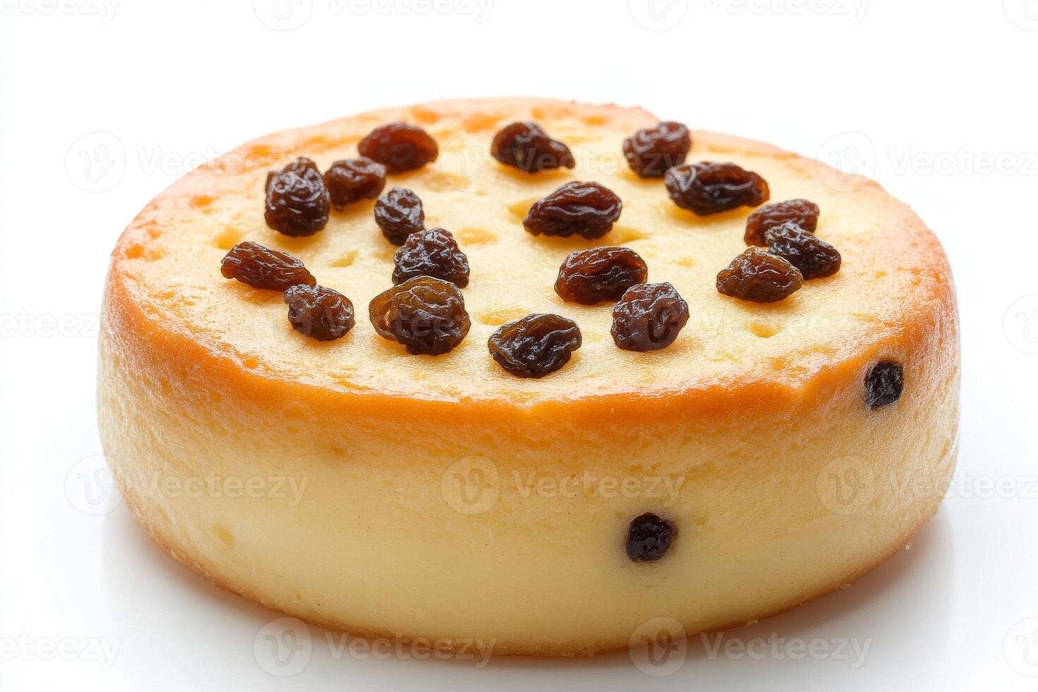 A cake with raisins on top photo
