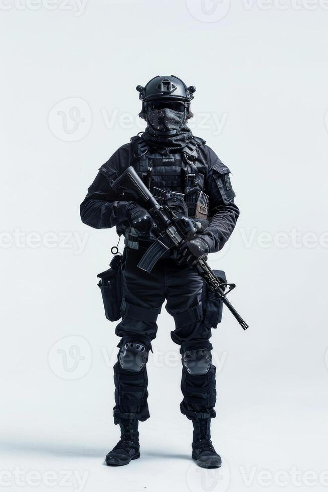 A man in a black suit and helmet with a gun photo