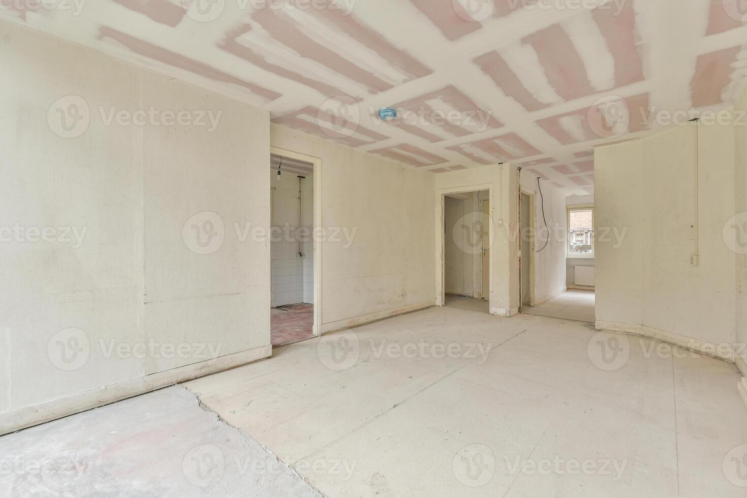 A room with a ceiling that is being painted photo