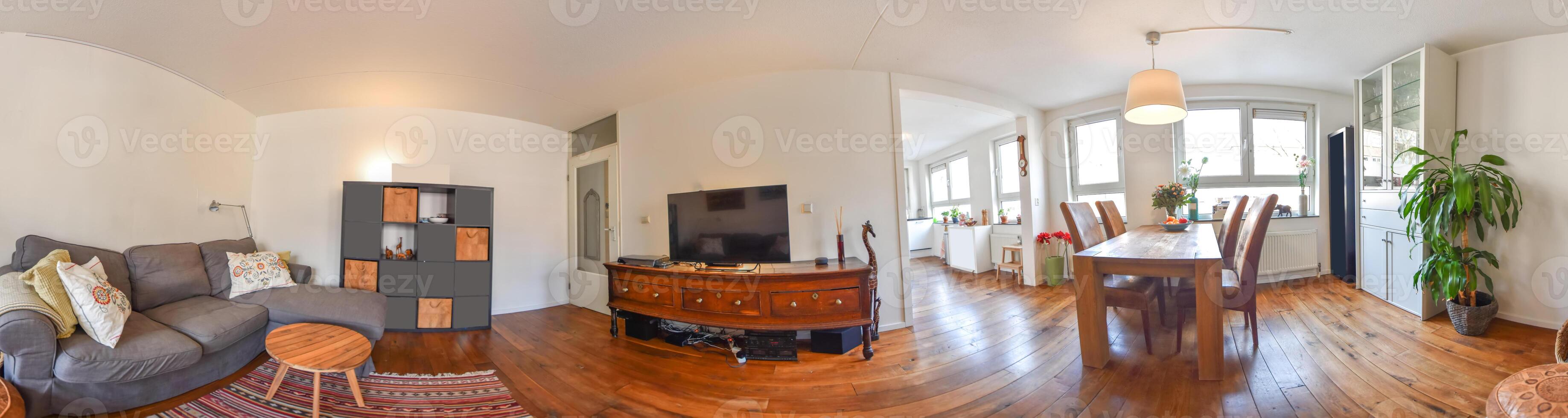 A 360 degree view of a living room with a couch and a tv photo