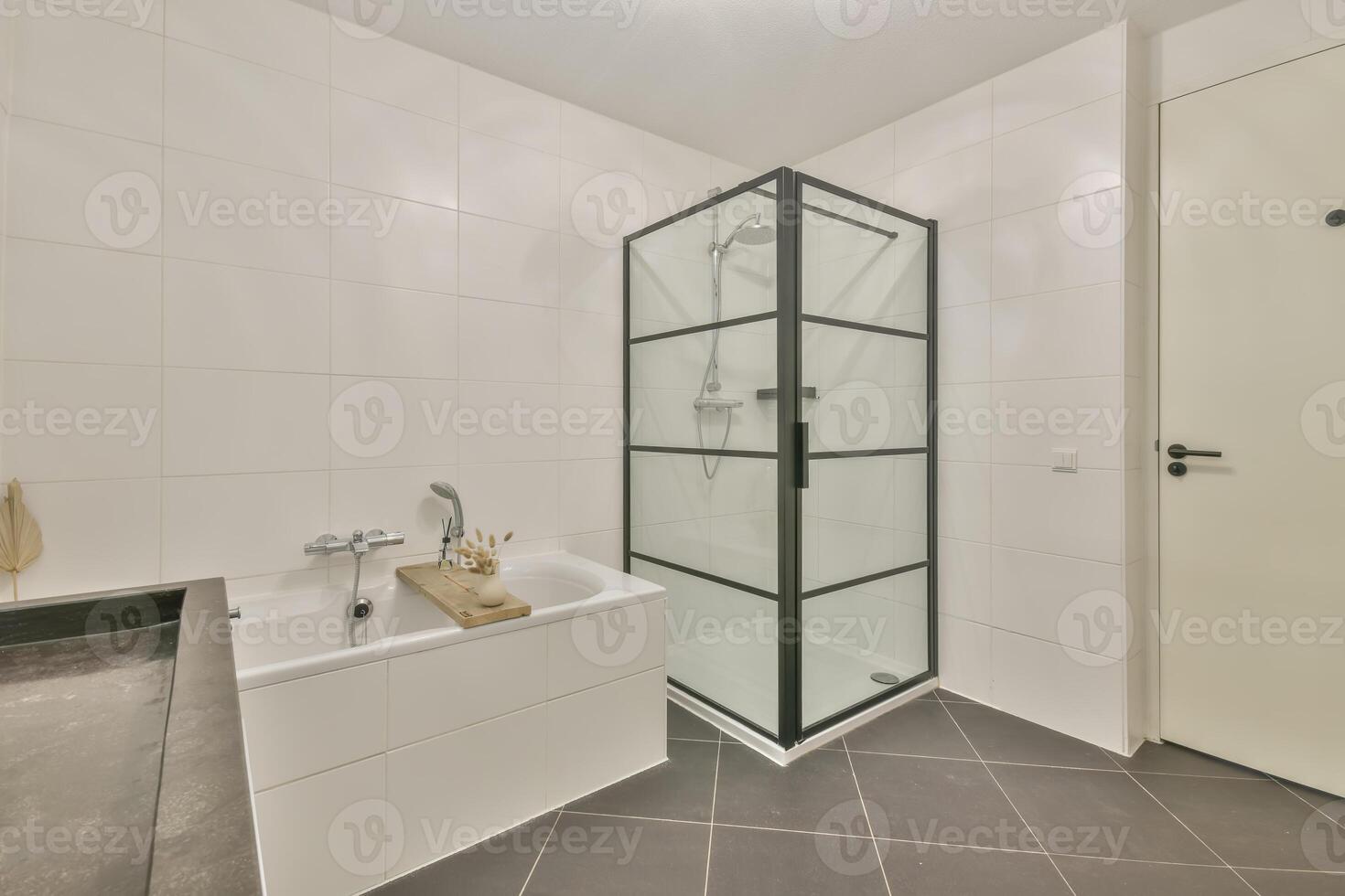 A bathroom with a shower and sink photo