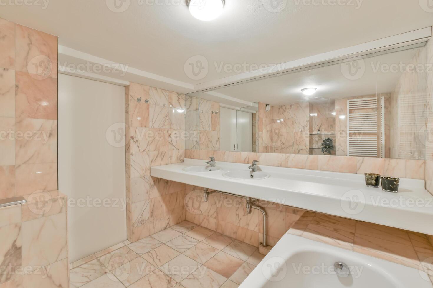 A bathroom with a sink and a mirror photo