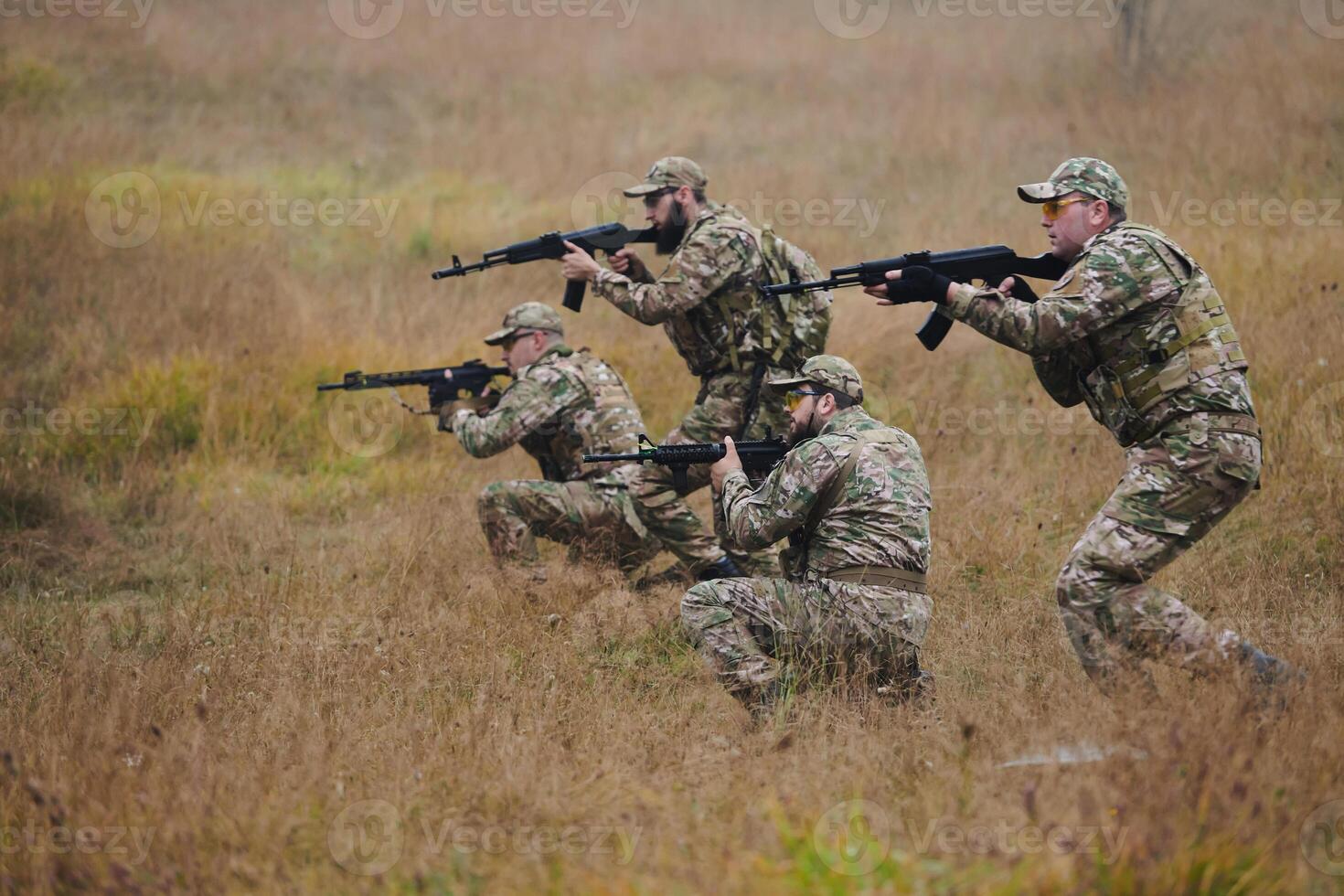 A disciplined and specialized military unit, donned in camouflage, strategically patrolling and maintaining control in a high-stakes environment, showcasing their precision, unity, and readiness for photo