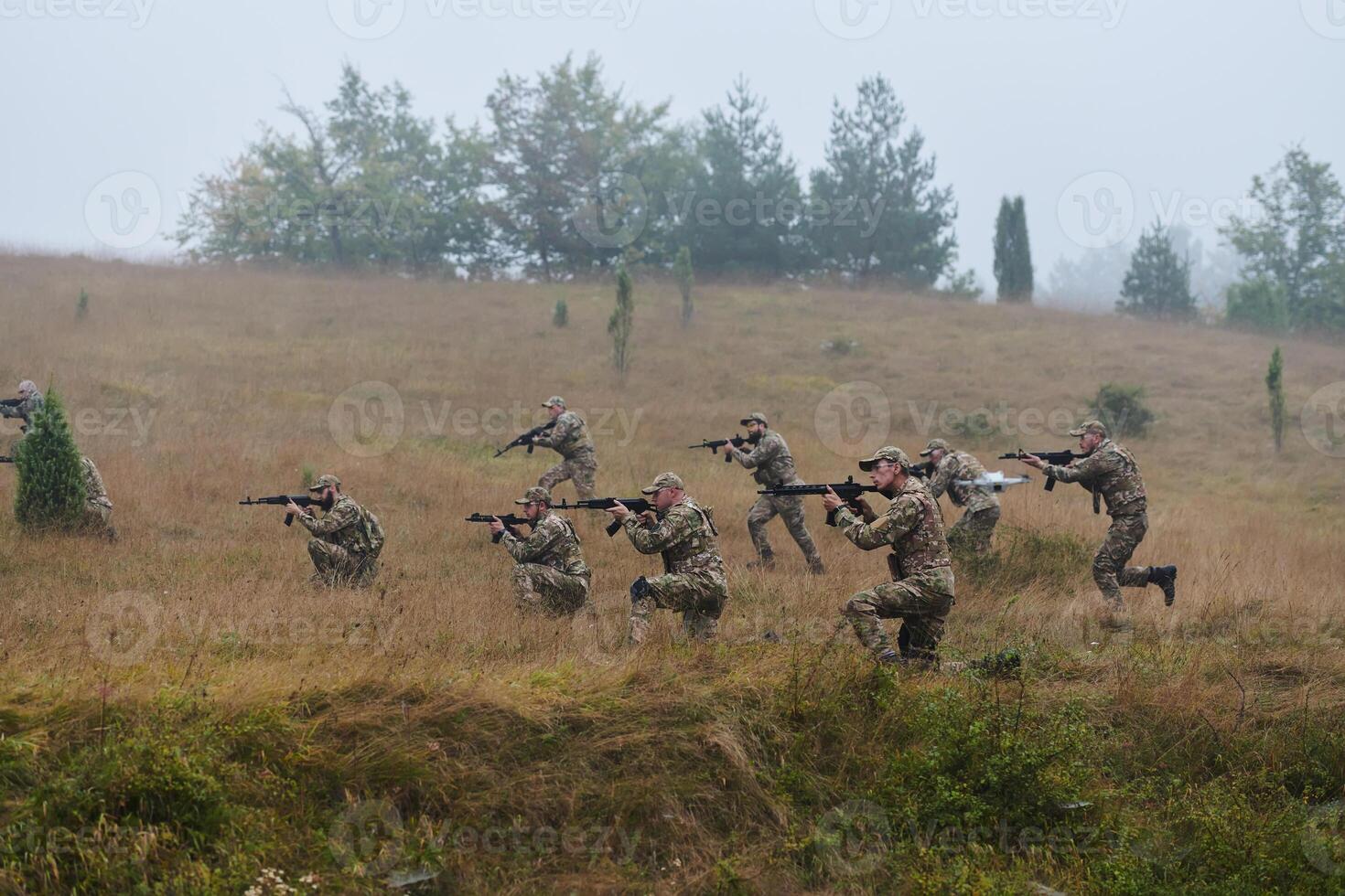 A disciplined and specialized military unit, donned in camouflage, strategically patrolling and maintaining control in a high-stakes environment, showcasing their precision, unity, and readiness for photo