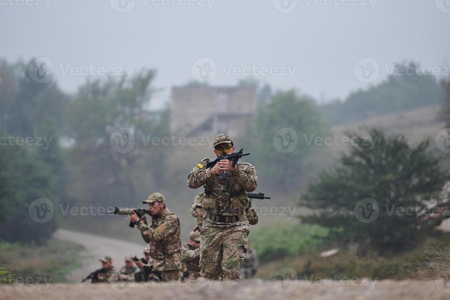 A disciplined and specialized military unit, donned in camouflage, strategically patrolling and maintaining control in a high-stakes environment, showcasing their precision, unity, and readiness for photo