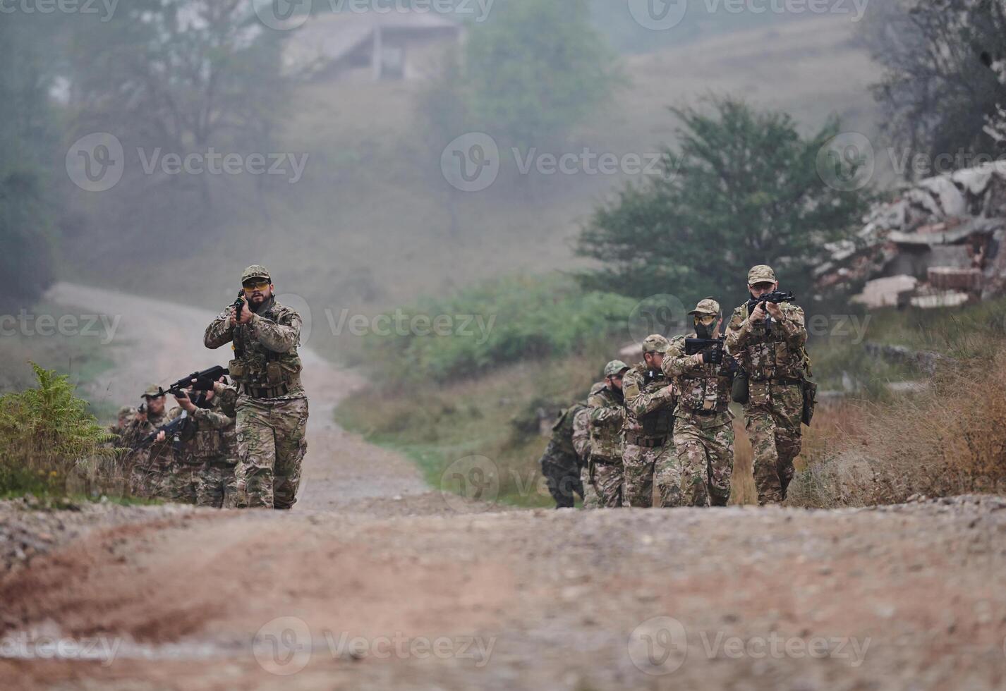 A disciplined and specialized military unit, donned in camouflage, strategically patrolling and maintaining control in a high-stakes environment, showcasing their precision, unity, and readiness for photo