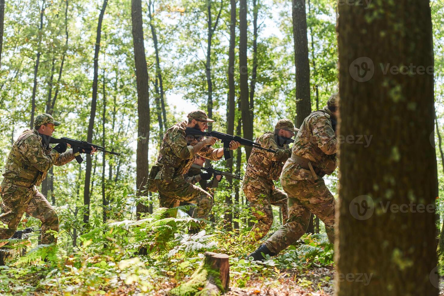 A disciplined and specialized military unit, donned in camouflage, strategically patrolling and maintaining control in a high-stakes environment, showcasing their precision, unity, and readiness for photo