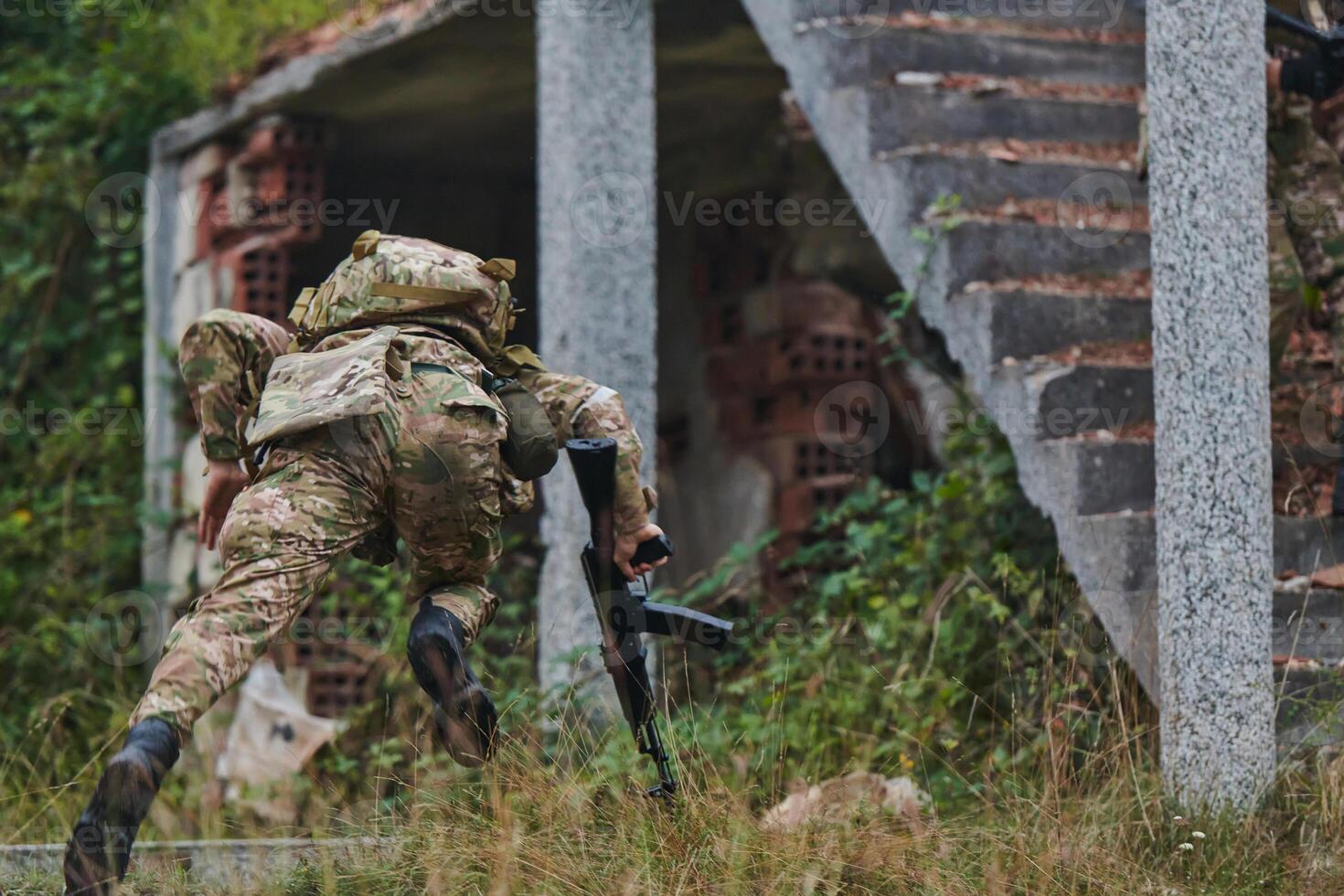In a high stakes mission, a specialized military unit executes a tactical operation to secure a dangerous house where terrorists are believed to be hiding, showcasing precision and coordinated photo