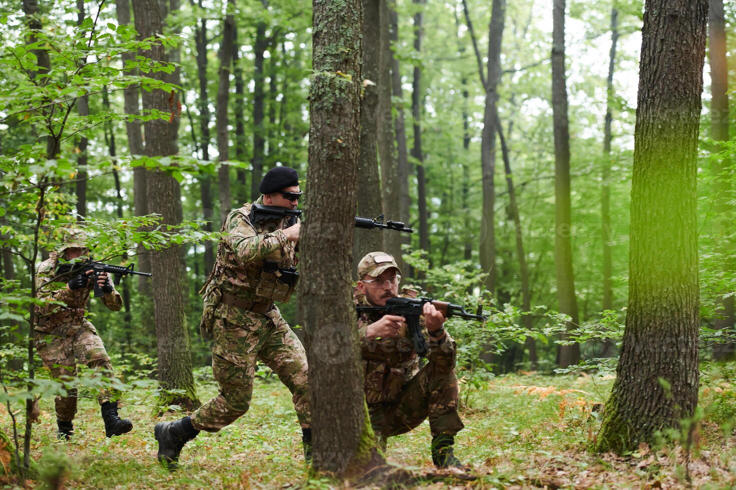 A disciplined and specialized military unit, donned in camouflage, strategically patrolling and maintaining control in a high-stakes environment, showcasing their precision, unity, and readiness for photo