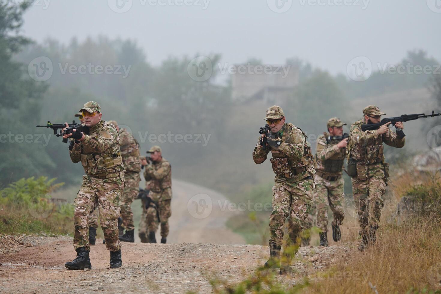 A disciplined and specialized military unit, donned in camouflage, strategically patrolling and maintaining control in a high-stakes environment, showcasing their precision, unity, and readiness for photo