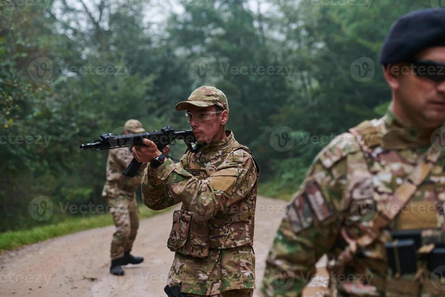 A disciplined and specialized military unit, donned in camouflage, strategically patrolling and maintaining control in a high-stakes environment, showcasing their precision, unity, and readiness for photo