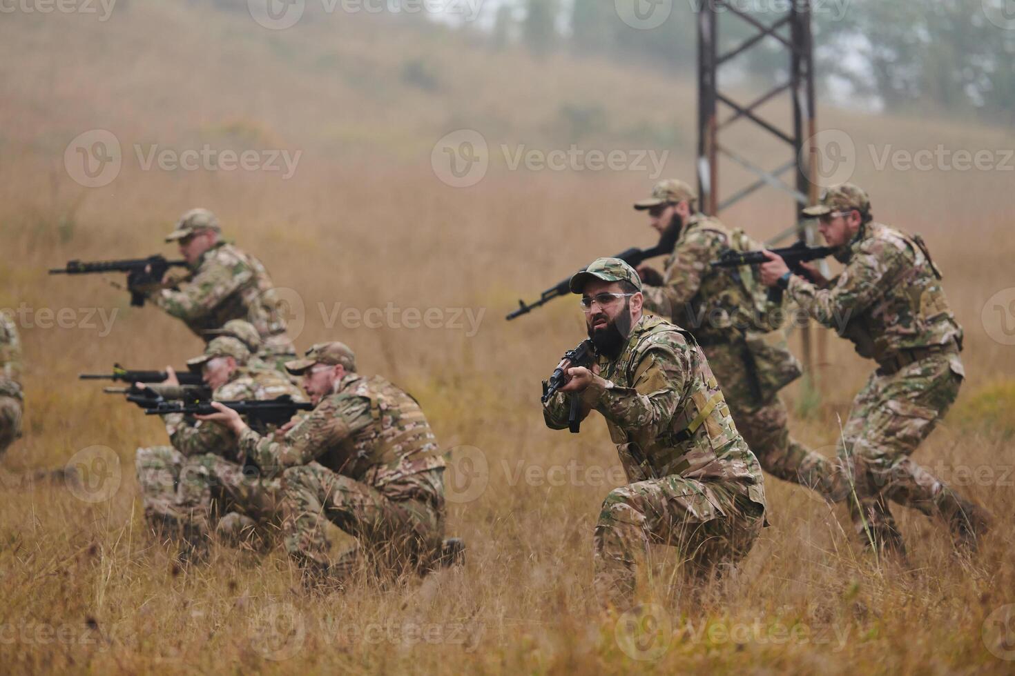 A disciplined and specialized military unit, donned in camouflage, strategically patrolling and maintaining control in a high-stakes environment, showcasing their precision, unity, and readiness for photo