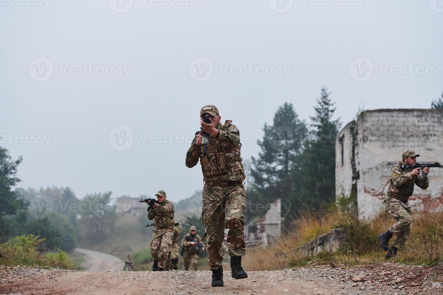 A disciplined and specialized military unit, donned in camouflage, strategically patrolling and maintaining control in a high-stakes environment, showcasing their precision, unity, and readiness for photo