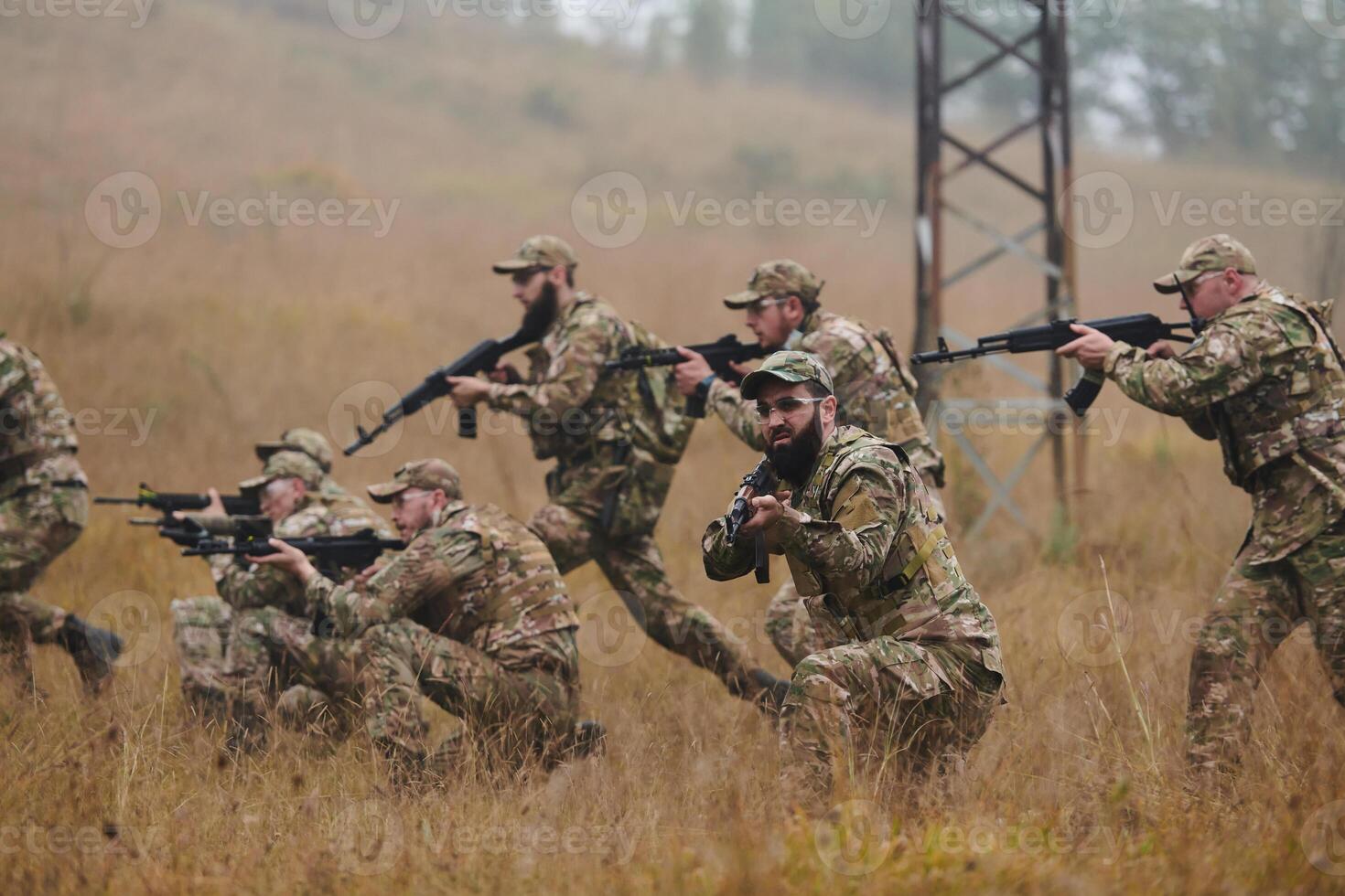 A disciplined and specialized military unit, donned in camouflage, strategically patrolling and maintaining control in a high-stakes environment, showcasing their precision, unity, and readiness for photo