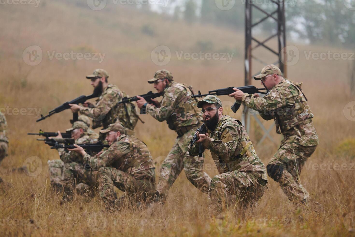 A disciplined and specialized military unit, donned in camouflage, strategically patrolling and maintaining control in a high-stakes environment, showcasing their precision, unity, and readiness for photo