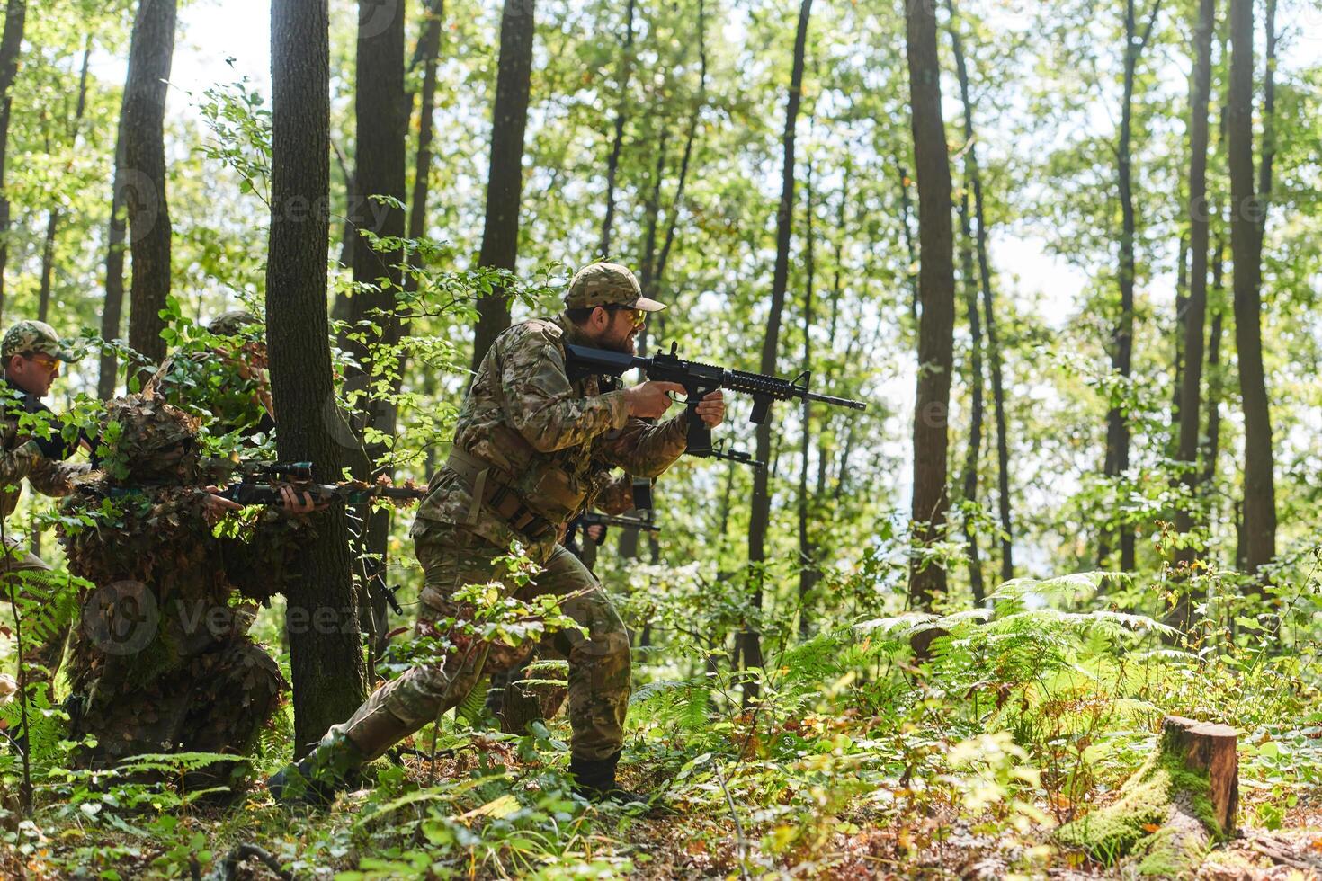 A disciplined and specialized military unit, donned in camouflage, strategically patrolling and maintaining control in a high-stakes environment, showcasing their precision, unity, and readiness for photo