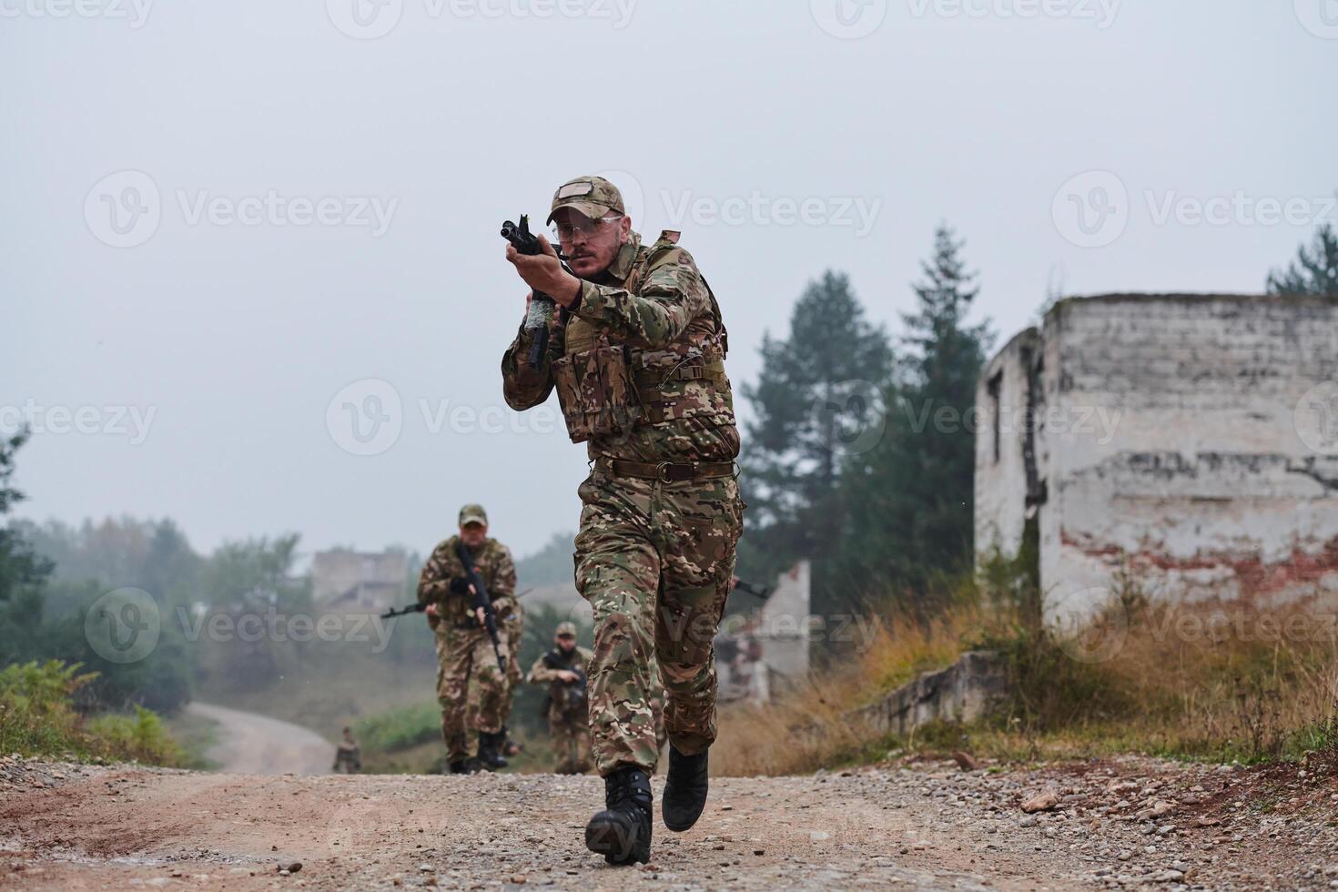 A disciplined and specialized military unit, donned in camouflage, strategically patrolling and maintaining control in a high-stakes environment, showcasing their precision, unity, and readiness for photo