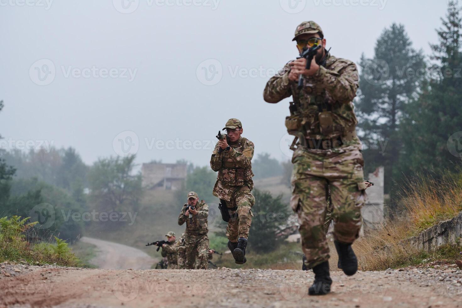 A disciplined and specialized military unit, donned in camouflage, strategically patrolling and maintaining control in a high-stakes environment, showcasing their precision, unity, and readiness for photo