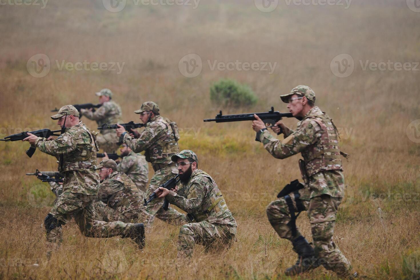 A disciplined and specialized military unit, donned in camouflage, strategically patrolling and maintaining control in a high-stakes environment, showcasing their precision, unity, and readiness for photo