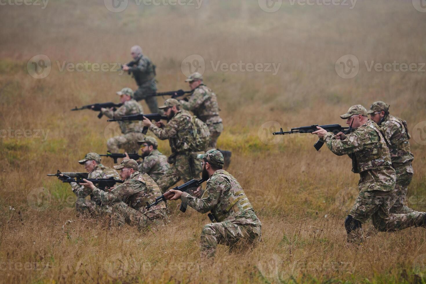 A disciplined and specialized military unit, donned in camouflage, strategically patrolling and maintaining control in a high-stakes environment, showcasing their precision, unity, and readiness for photo
