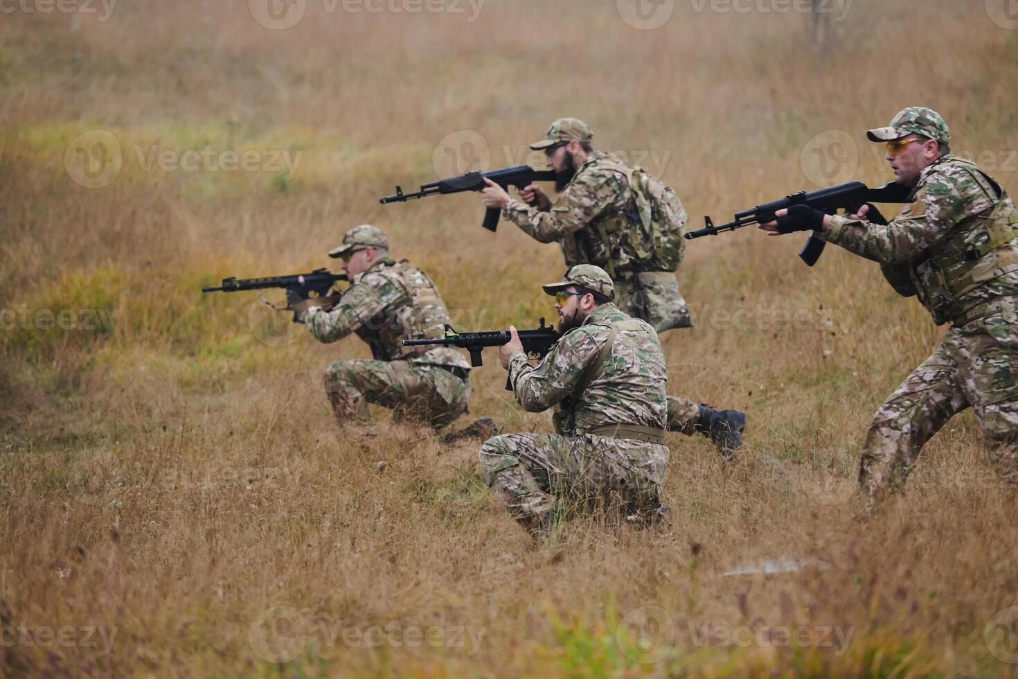 A disciplined and specialized military unit, donned in camouflage, strategically patrolling and maintaining control in a high-stakes environment, showcasing their precision, unity, and readiness for photo