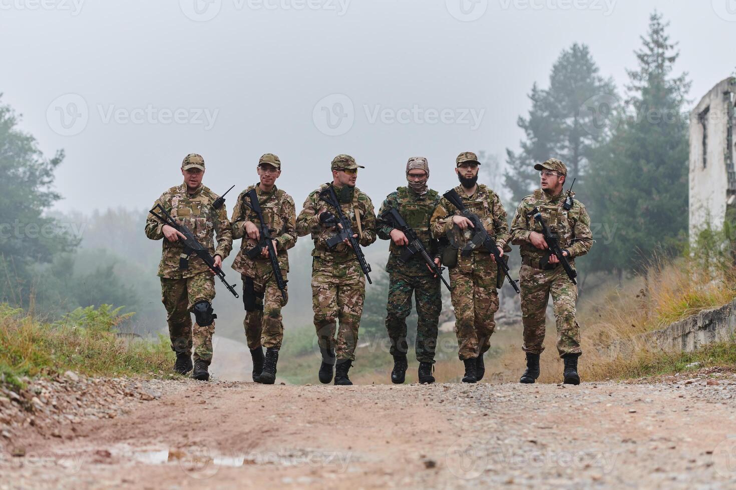 A disciplined and specialized military unit, donned in camouflage, strategically patrolling and maintaining control in a high-stakes environment, showcasing their precision, unity, and readiness for photo