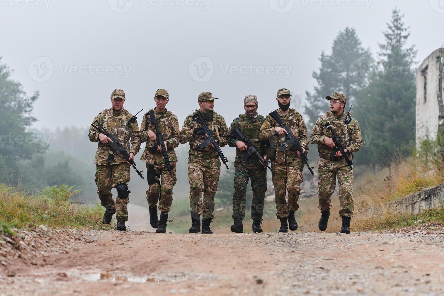 A disciplined and specialized military unit, donned in camouflage, strategically patrolling and maintaining control in a high-stakes environment, showcasing their precision, unity, and readiness for photo