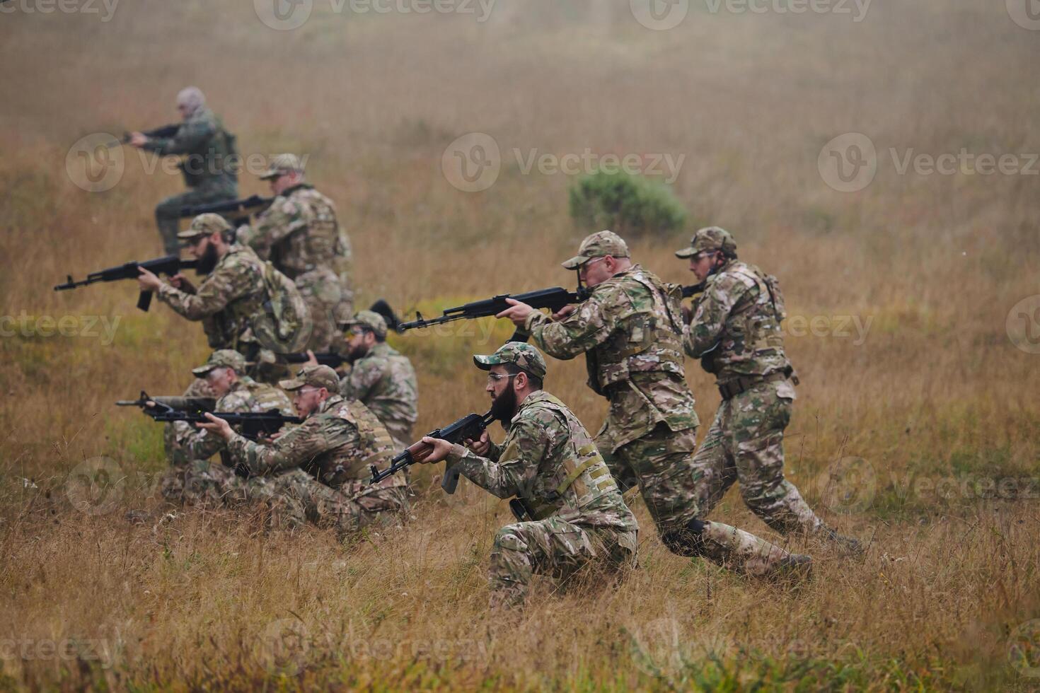 A disciplined and specialized military unit, donned in camouflage, strategically patrolling and maintaining control in a high-stakes environment, showcasing their precision, unity, and readiness for photo