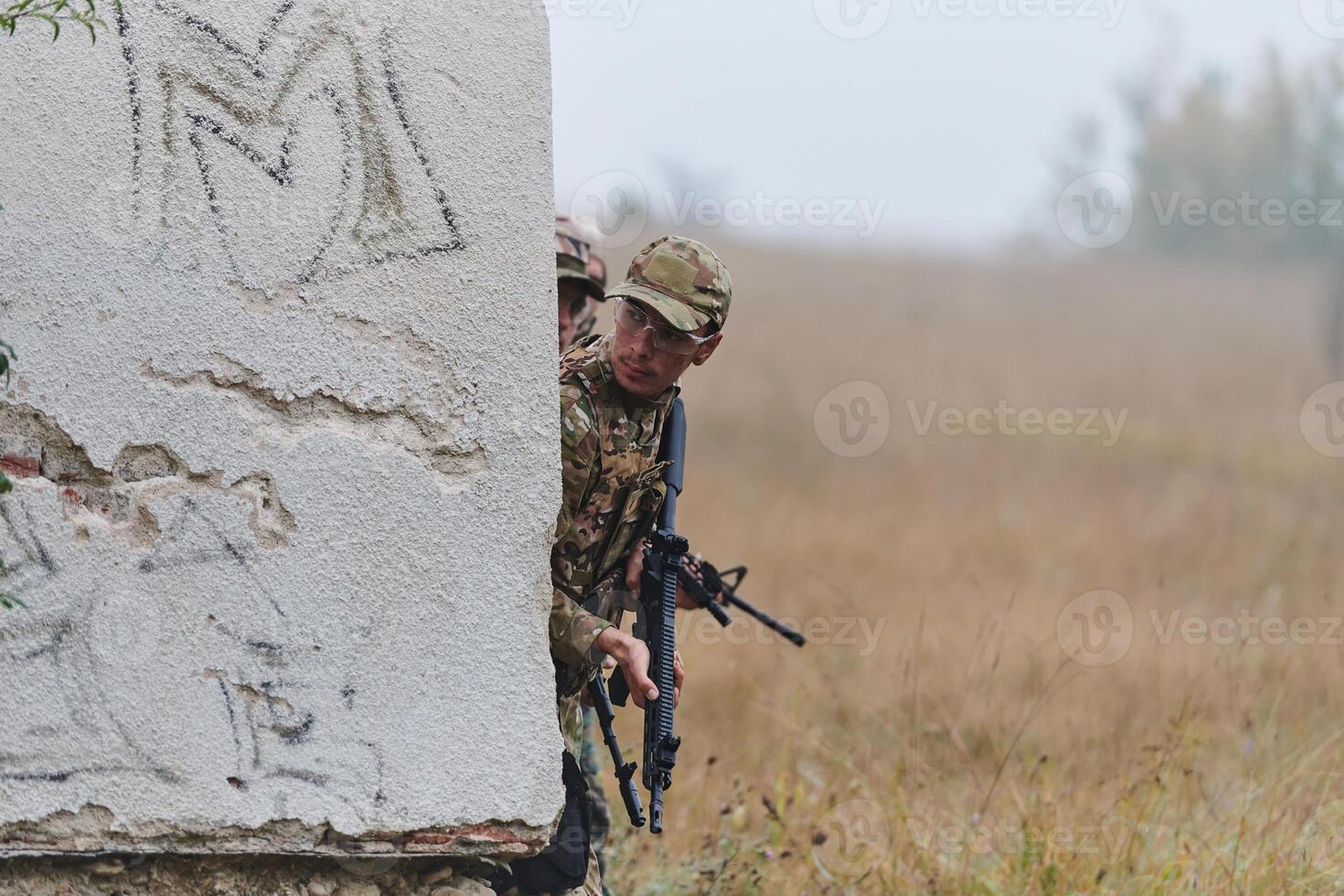 In a high stakes mission, a specialized military unit executes a tactical operation to secure a dangerous house where terrorists are believed to be hiding, showcasing precision and coordinated photo