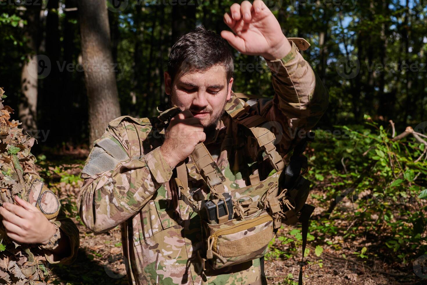 Elite soldier exudes focused determination and readiness, geared up for a perilous military operation, capturing the essence of courage and professionalism in the face of imminent danger photo