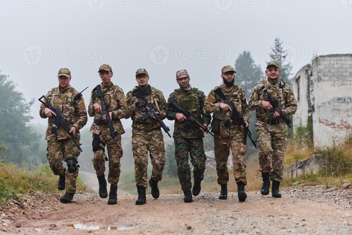 A disciplined and specialized military unit, donned in camouflage, strategically patrolling and maintaining control in a high-stakes environment, showcasing their precision, unity, and readiness for photo