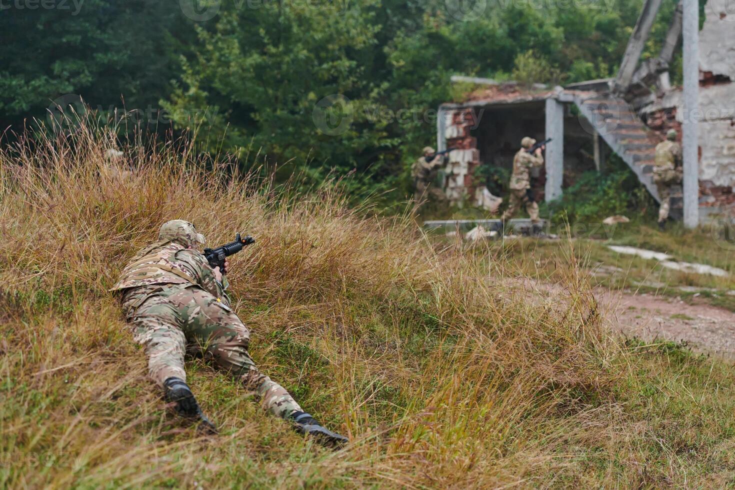 In a high stakes mission, a specialized military unit executes a tactical operation to secure a dangerous house where terrorists are believed to be hiding, showcasing precision and coordinated photo