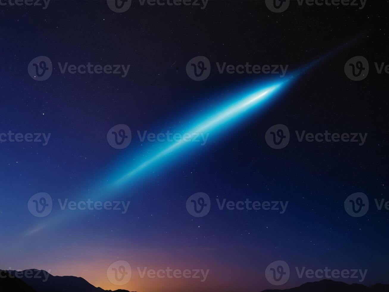 A bright colorful comet in the night sky of the earth. photo
